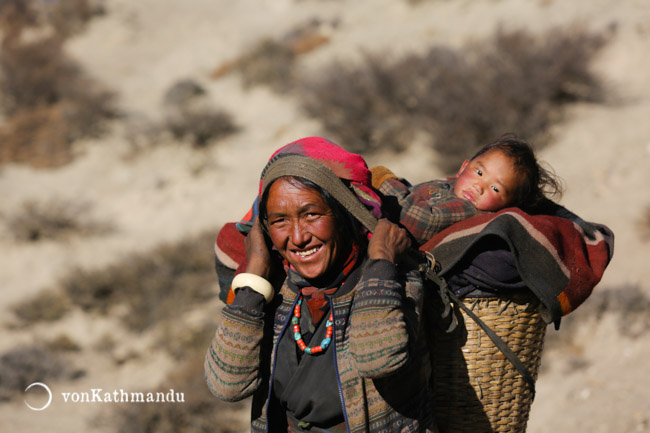 A Gurung woman with her child