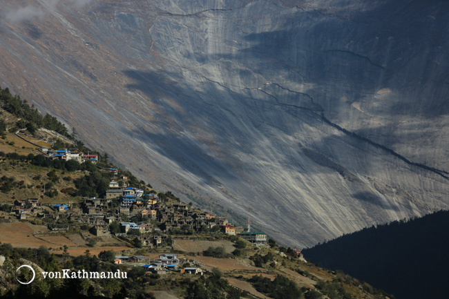 Upper Pisang village by the incredible rock formation of Swargadwaari, which translates to gateway to heaven