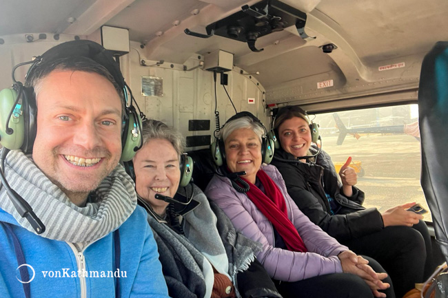 Passengers posing inside heli before taking off in Kathmandu airport