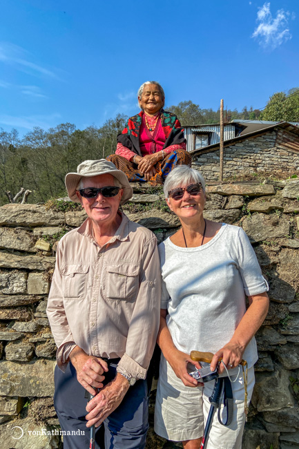 Trekkers in Ghandruk with a local lady