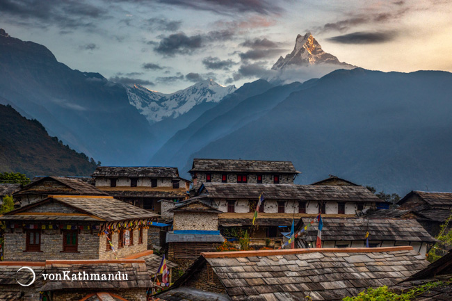 First rays of light on Machhapuchare at the rustic Ghandruk village