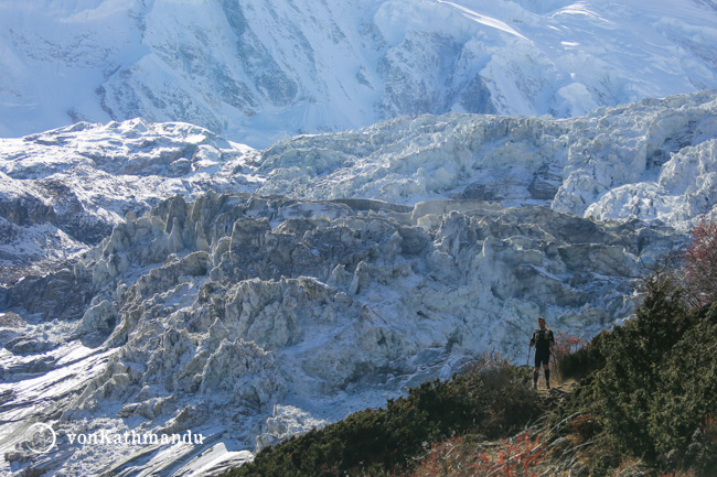 A trekker walks down from Manaslu Base Camp