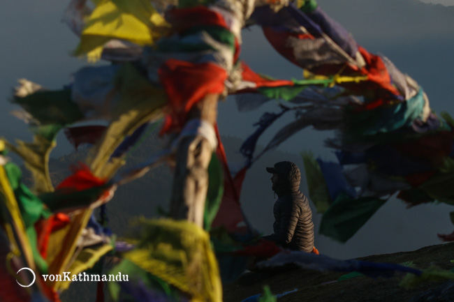 At Pikey Peak top, surrounded by prayer flags