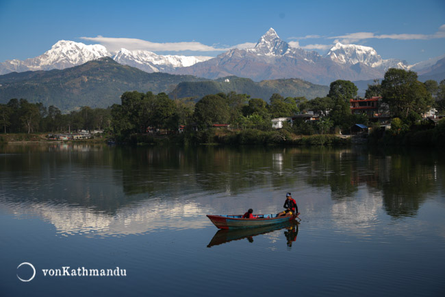 Boating on the reflection of Annapurnas on Phewa Lake