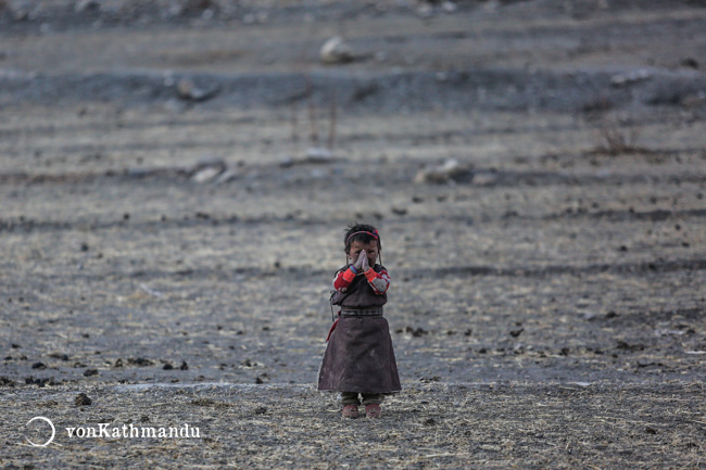 Gurung child greets namaste