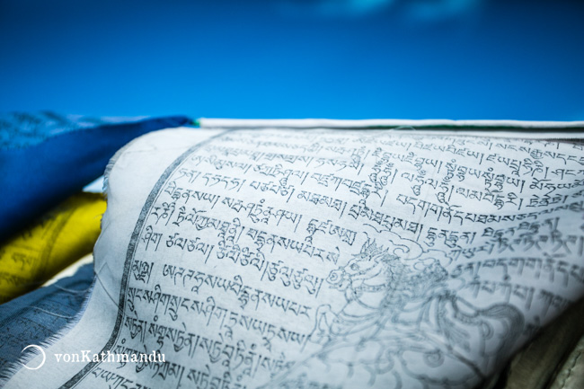 Prayer flags are hung outdoors so that winds can carry the inscribed prayers to all sentient beings