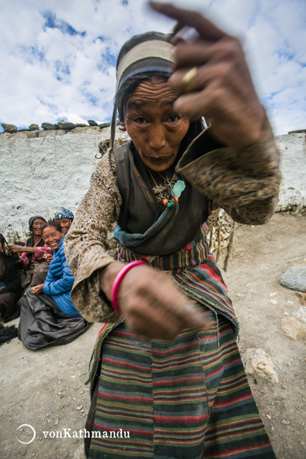 A local in Samzong dances for the camera