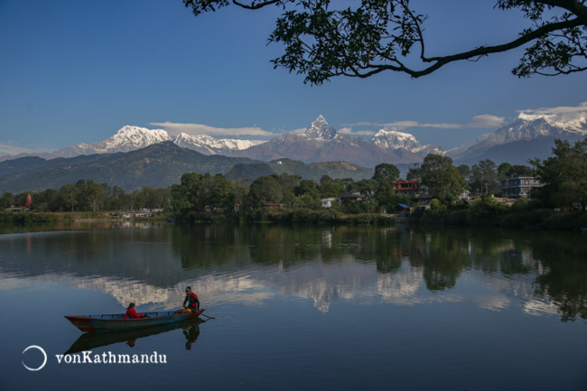 Boating on the reflection of Annapurnas on Phewa Lake