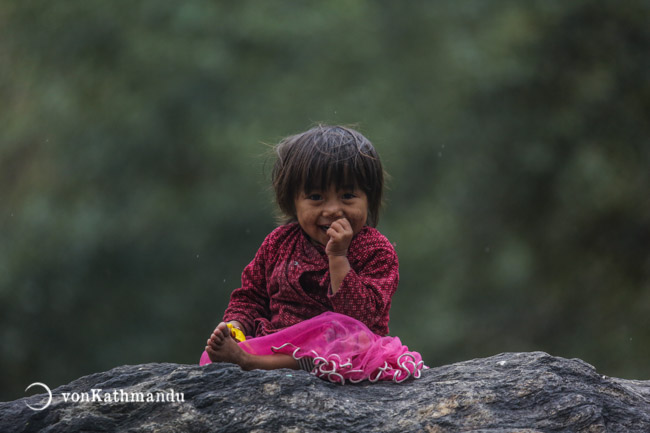 Gurung girl smiles at trekkers