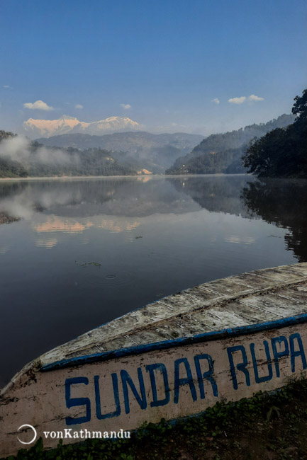 Reflection of mountains on Rupa Lake