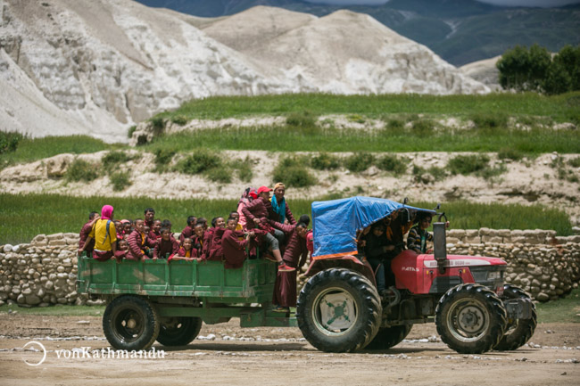 Hitching a ride on a tractor to the revered Chhoser village